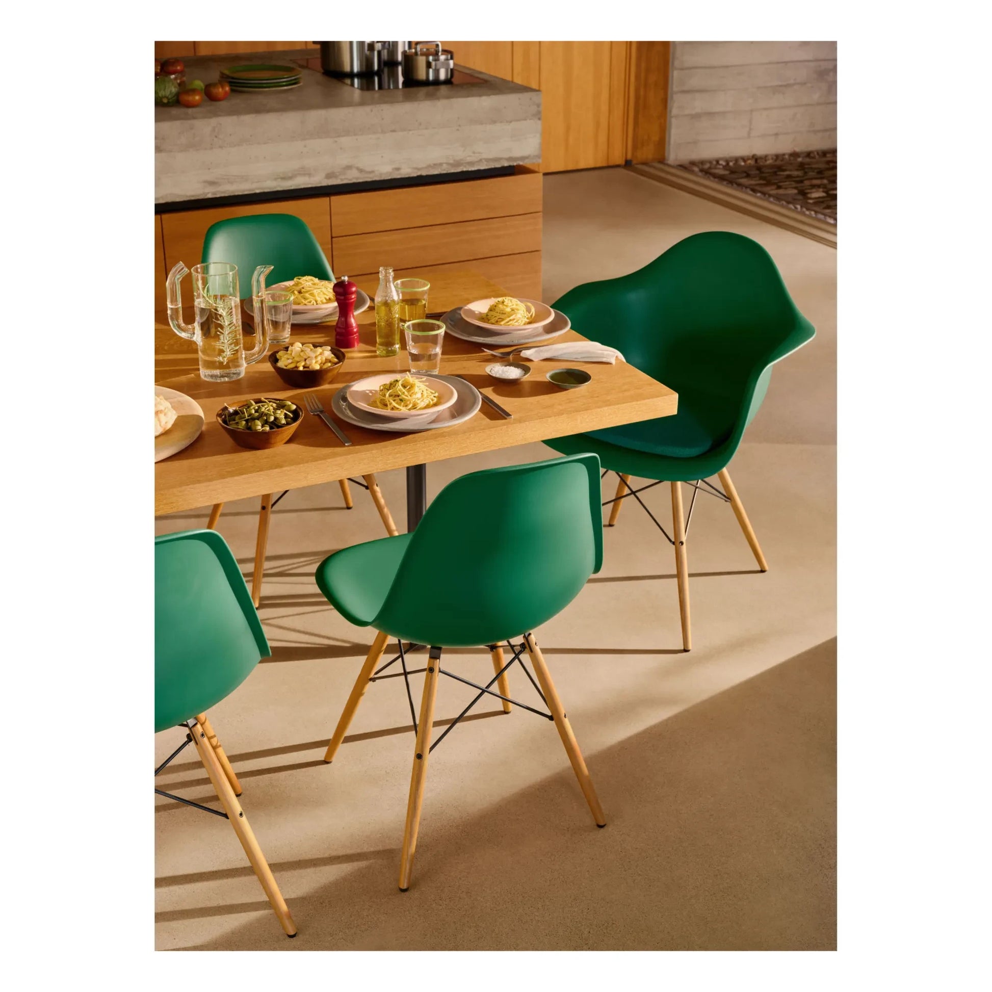 Vitra - DSW plastic chair - maple base - Charles &amp; Ray Eames | Emerald green
