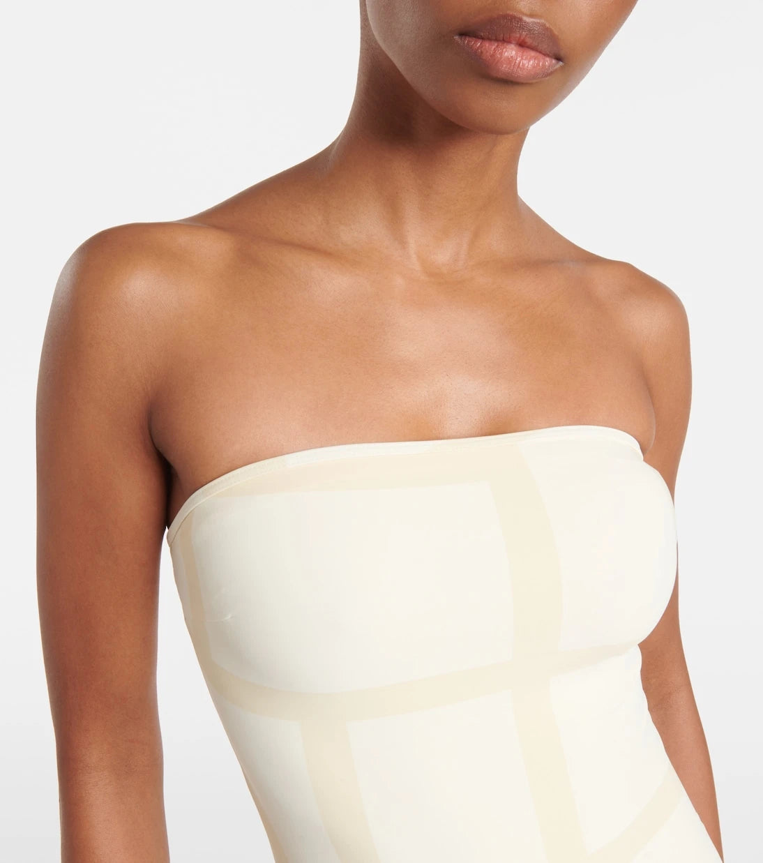 Toteme - Monogram strapless jersey swimsuit