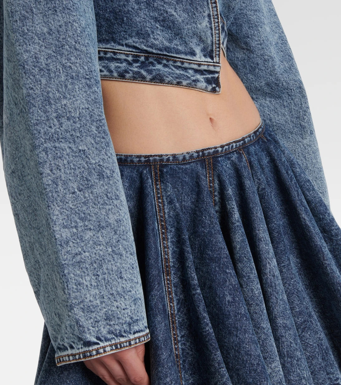 Alaïa - Asymmetric cropped denim jacket