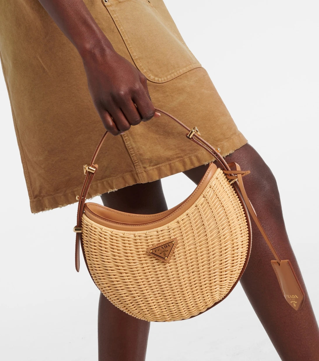 Prada - Arqué woven leather-trimmed shoulder bag