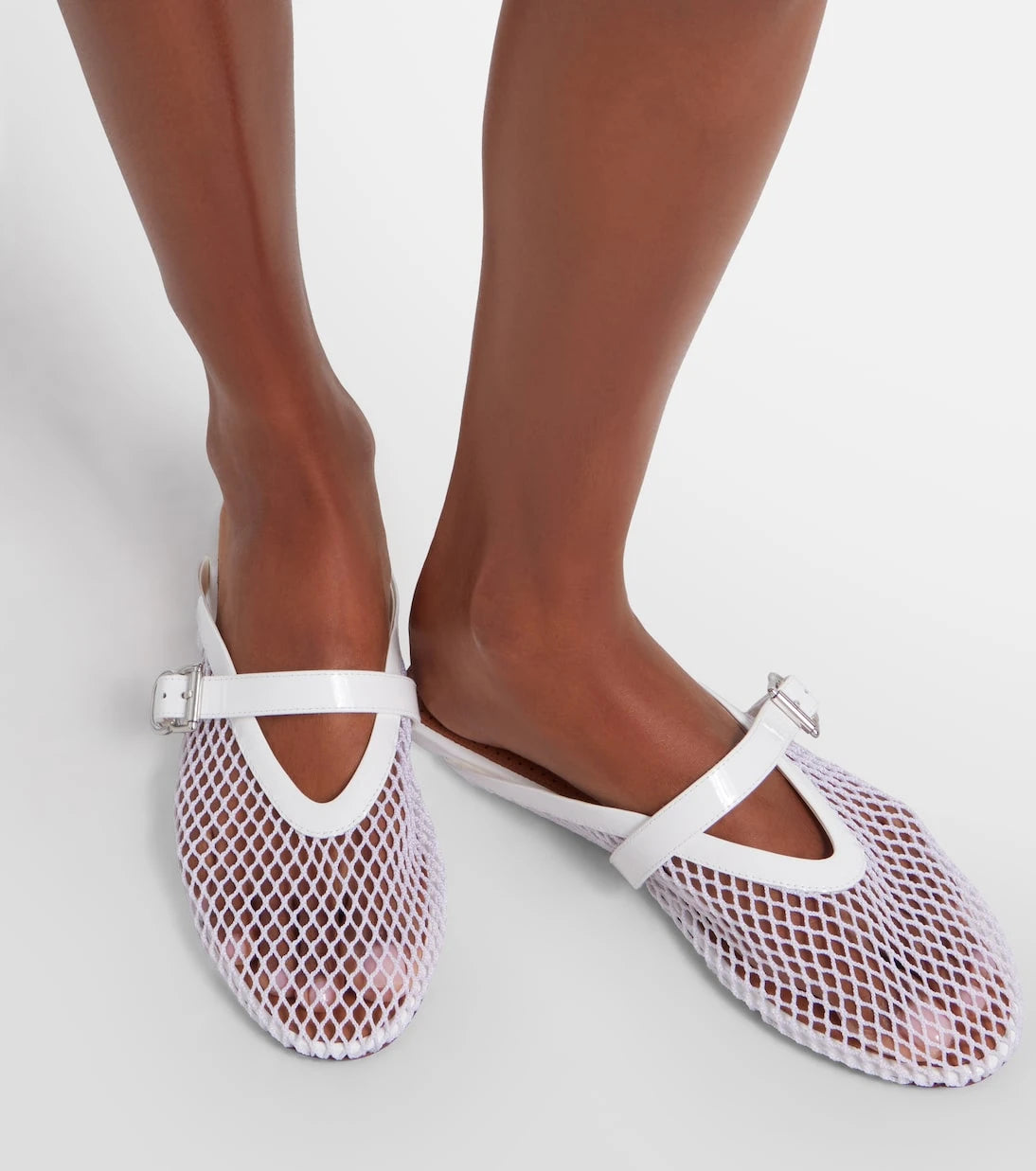 Alaïa - Fishnet leather-trimmed slip-on mules