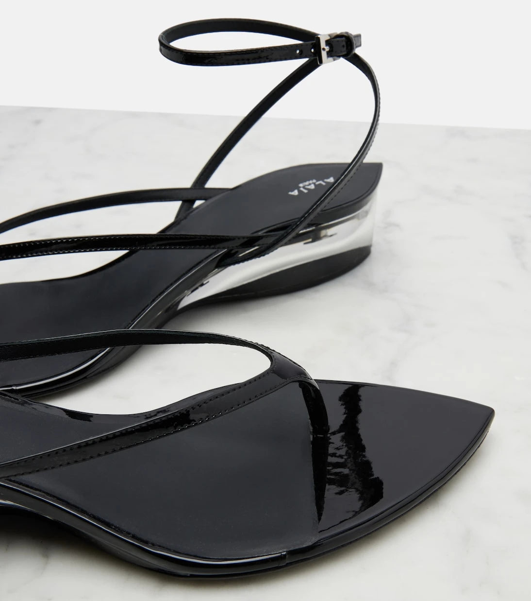 Alaïa - Invisible patent leather thong sandals