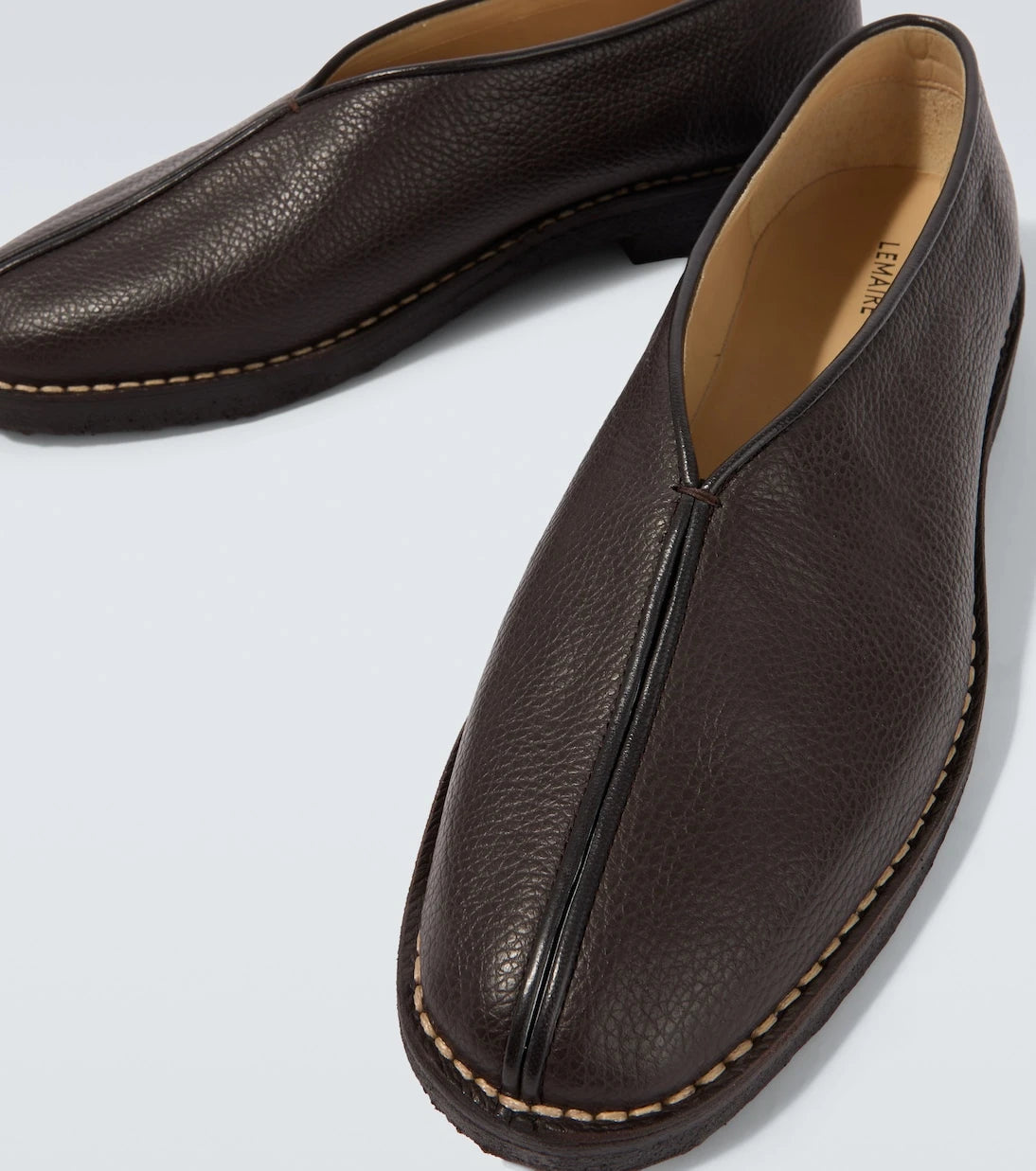 Lemaire - Piped leather slip-on shoes