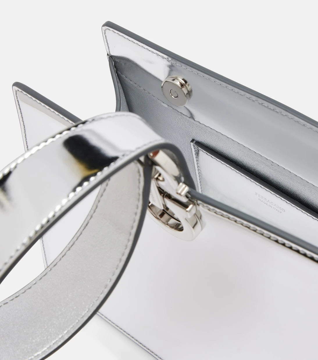 Ferragamo - Gancini Small metallic leather clutch