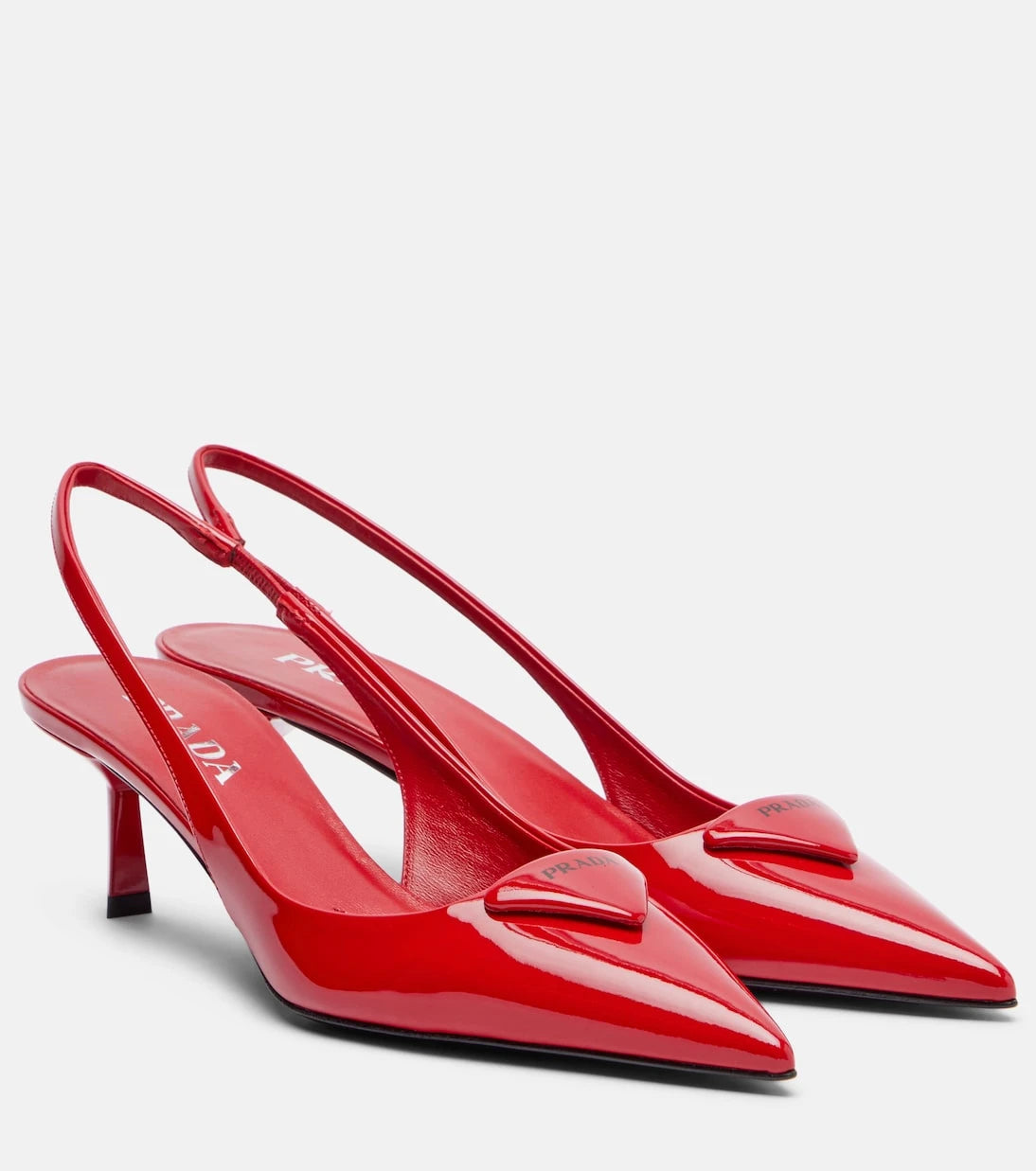 Prada - 55 patent leather slingback pumps