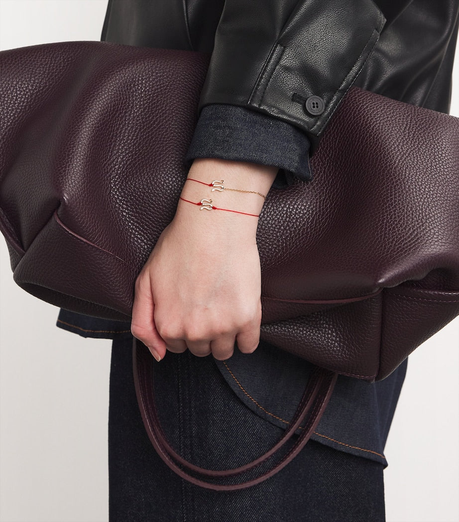 Yellow Gold and Diamond Snake String Bracelet