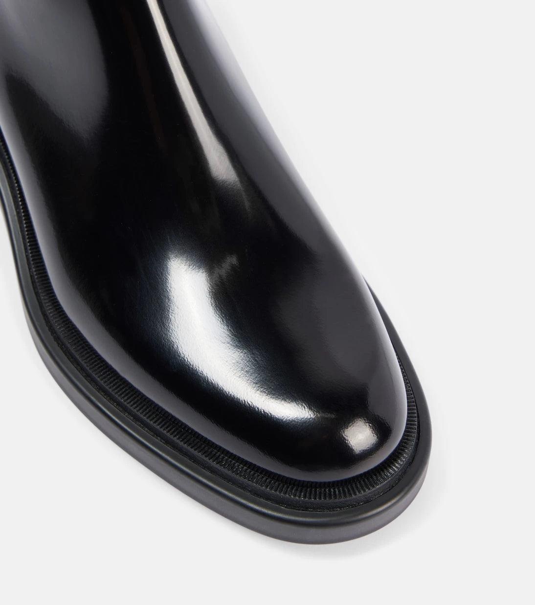 Christian Louboutin - حذاء الكاحل Urban Booty Lock من الجلد المصقول