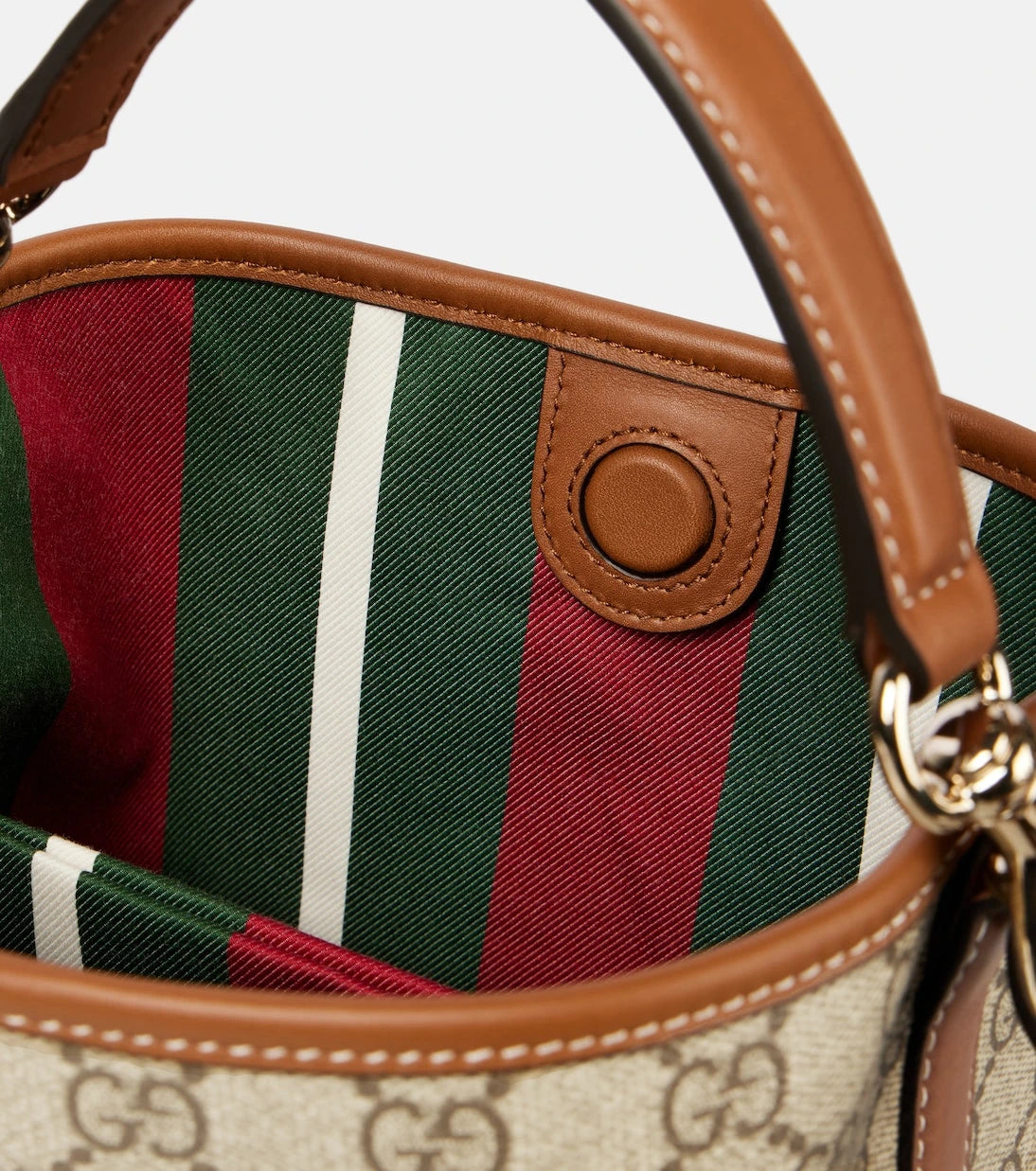 Gucci - حقيبة دلو صغيرة من الكانفاس بشعار GG