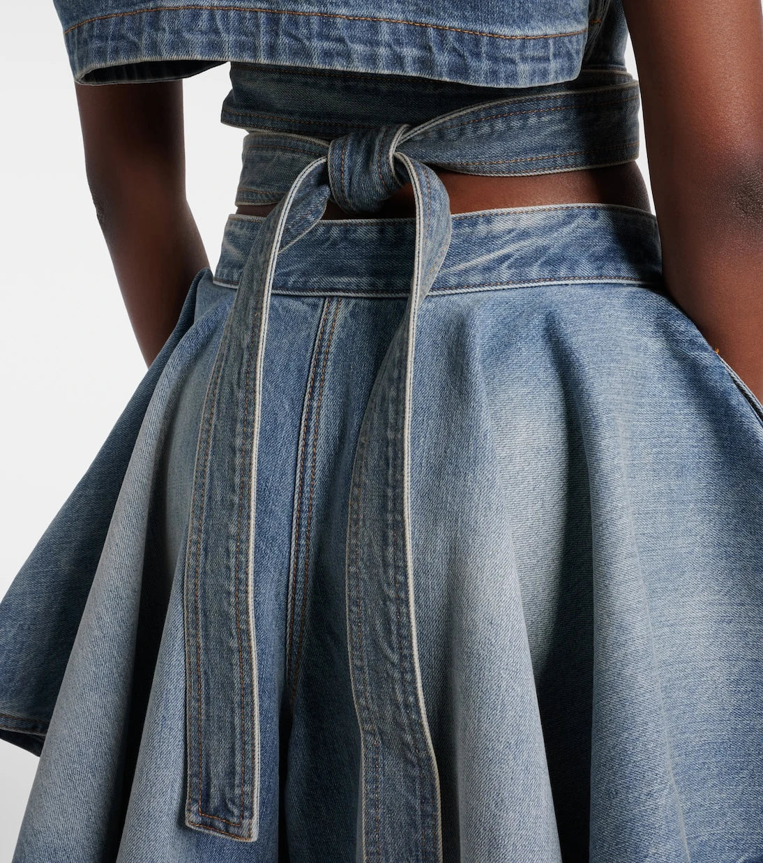 Alaïa - Belted denim crop top