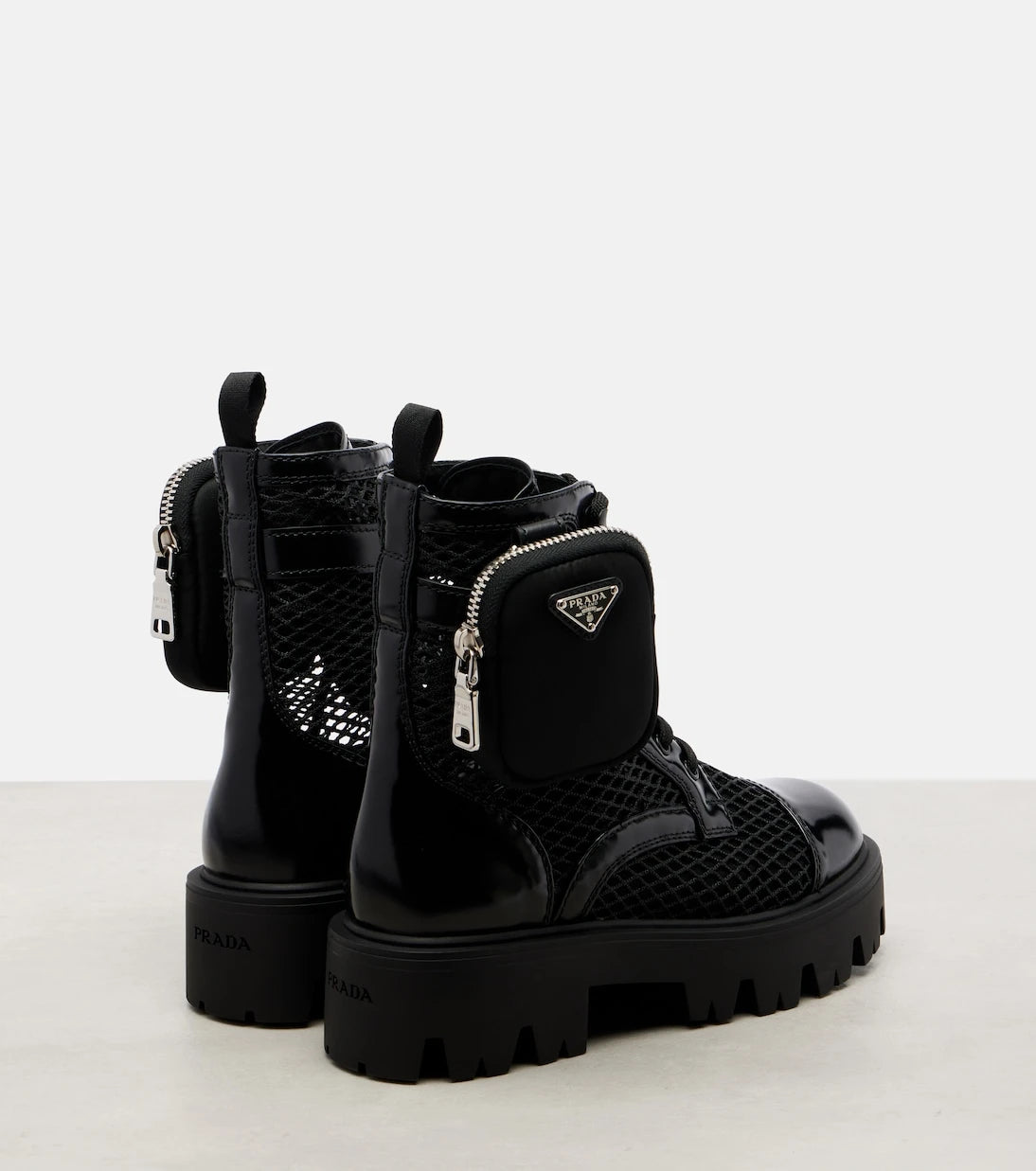 Prada - Leather-trimmed mesh combat boots