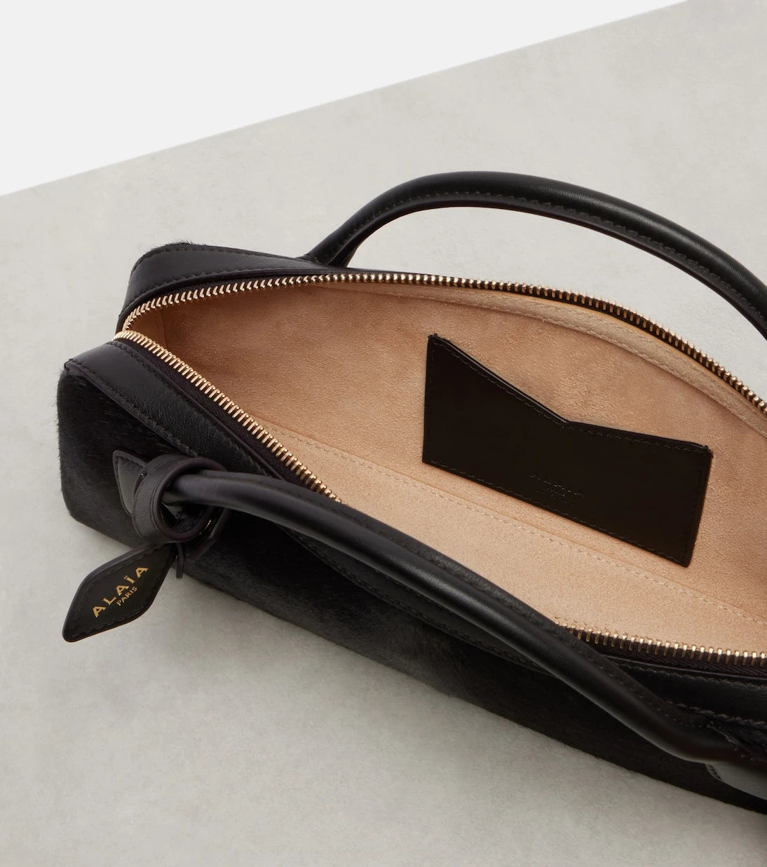 Alaïa - Le Teckel Small calf hair clutch