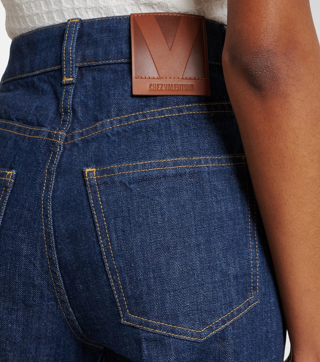 Valentino - High-rise flared jeans