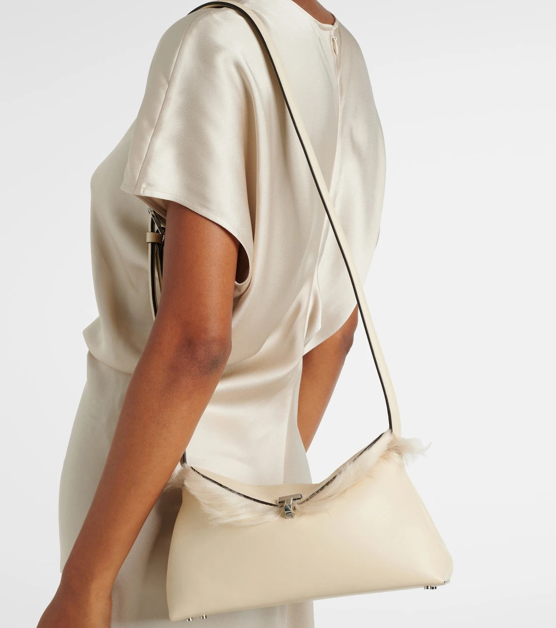 Toteme - T-Lock shearling-lined leather clutch