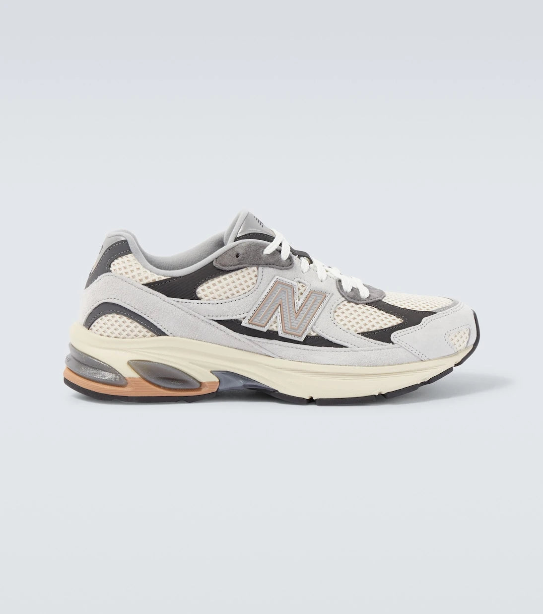 New Balance - حذاء رياضي شبكي وجلد سويدي 2010