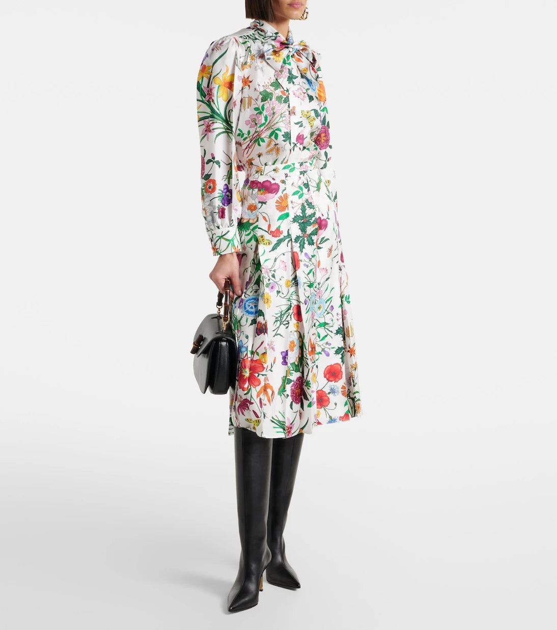 Gucci - حذاء بومبشيل الجلدي ذو الرقبة العالية