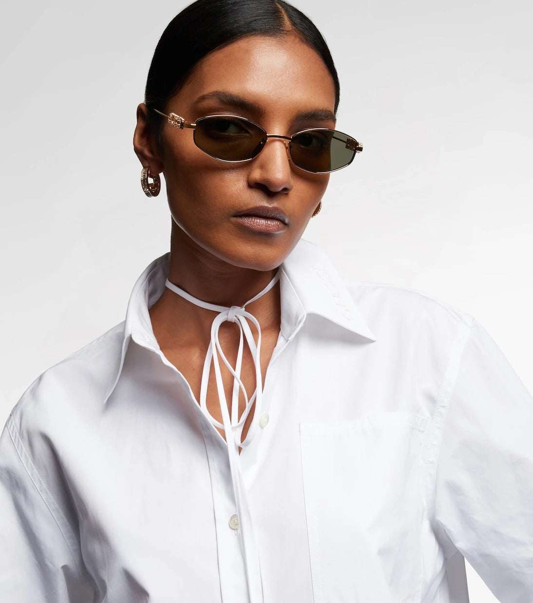 Gucci - نظارات شمسية بيضاوية مزينة بالشعار