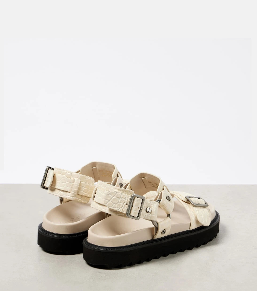 Acne Studios - صنادل جلدية بكعب منصة