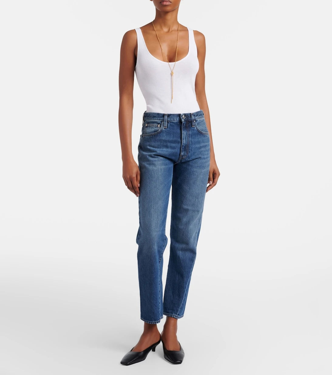 Toteme - Mid-rise twisted-seam straight jeans
