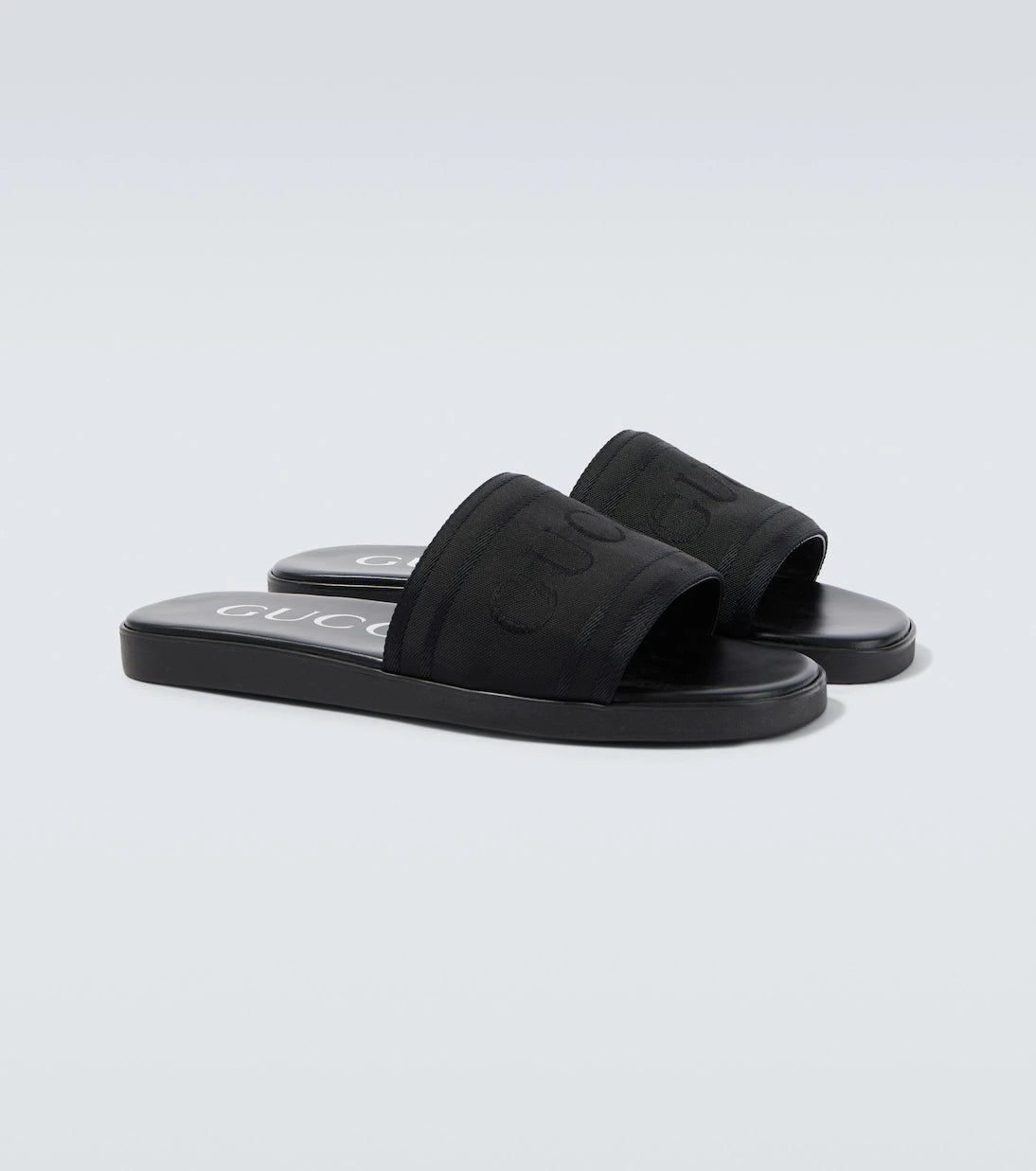 Gucci - Logo canvas and leather slides