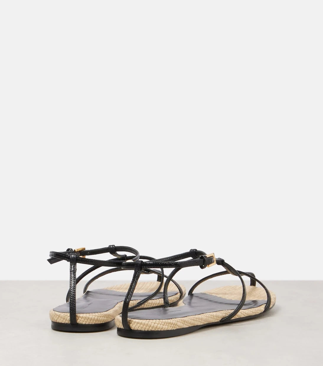 Khaite - Cage leather raffia-trimmed sandals