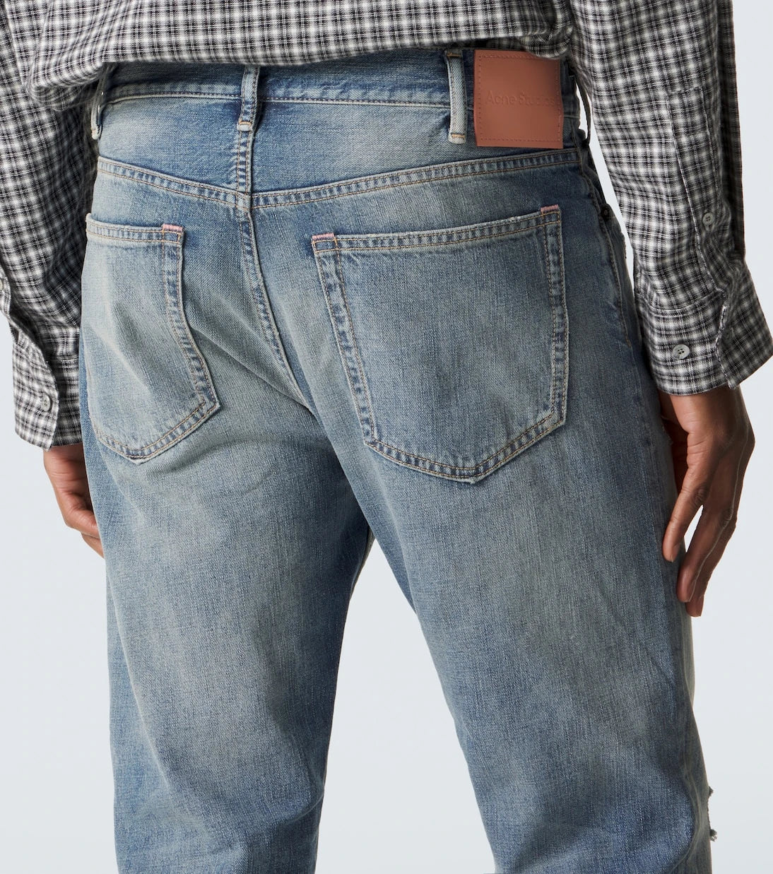 Acne Studios - بنطلون جينز 1979M بقصة ضيقة ومظهر مهترئ