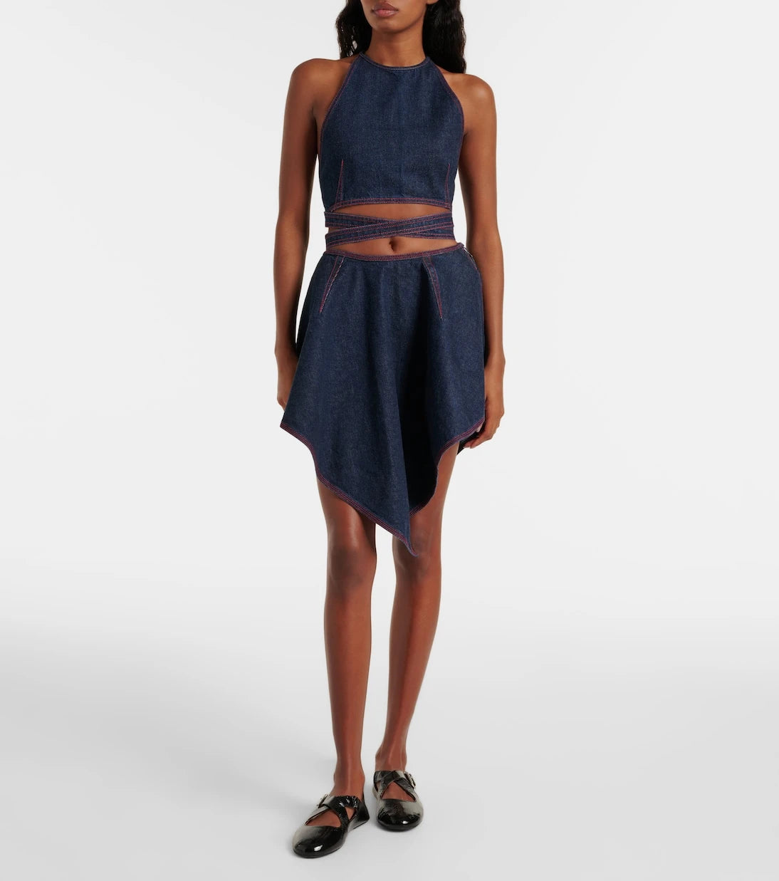 Alaïa - Triangle asymmetric denim miniskirt