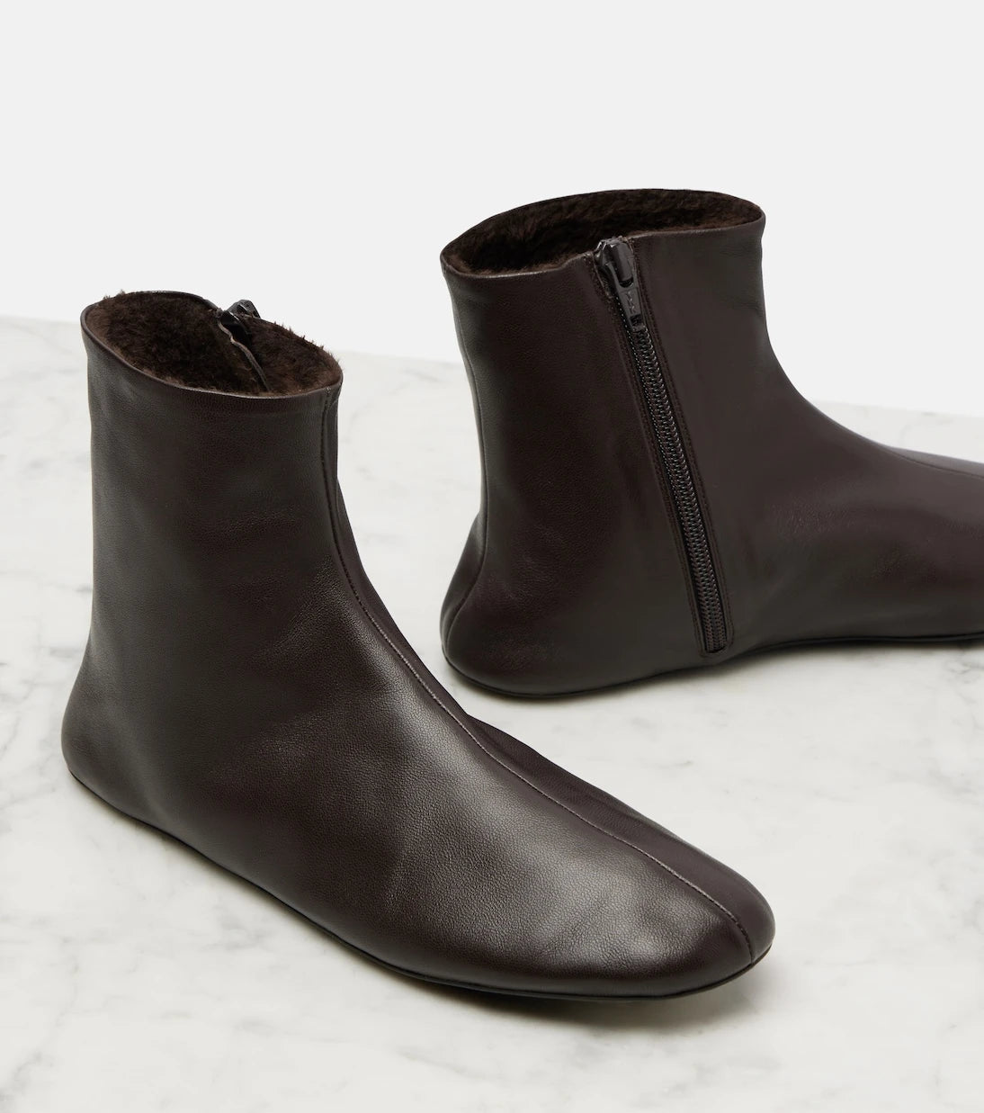 The Row - Stella shearling-lined leather ankle boots