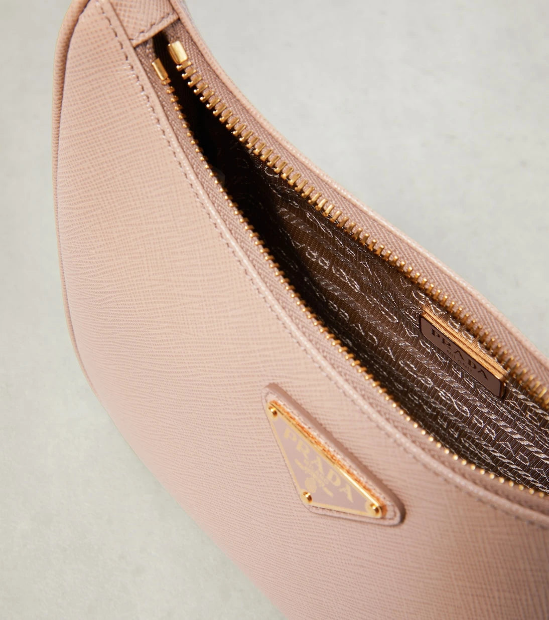Prada - Re-Edition Mini leather shoulder bag