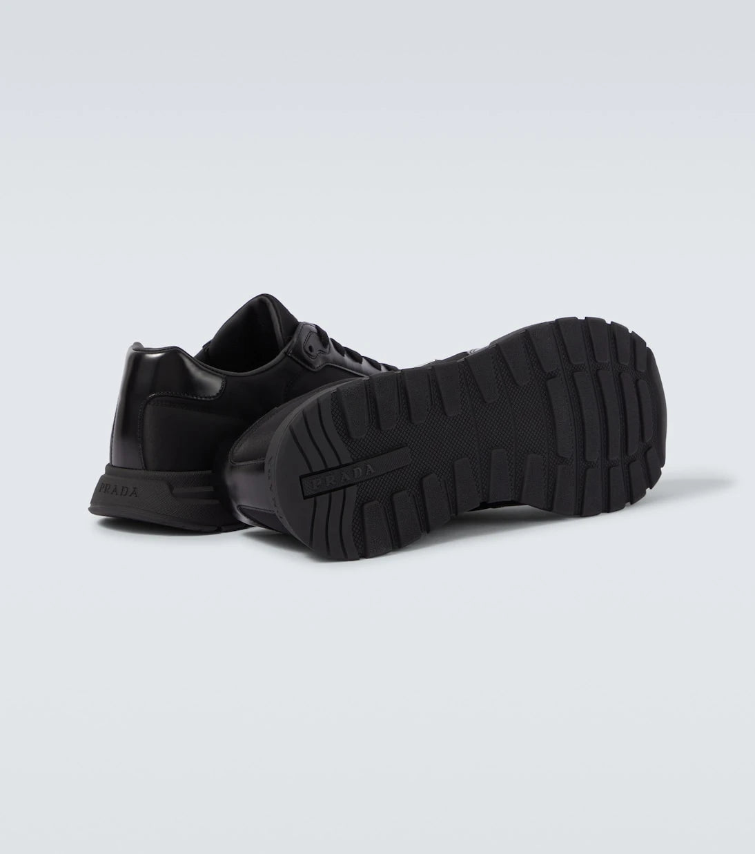 Prada - Logo leather-trimmed sneakers