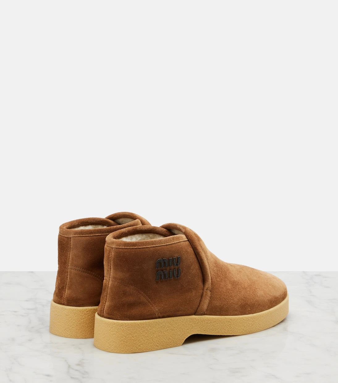 Miu Miu - Shearling-lined suede boots