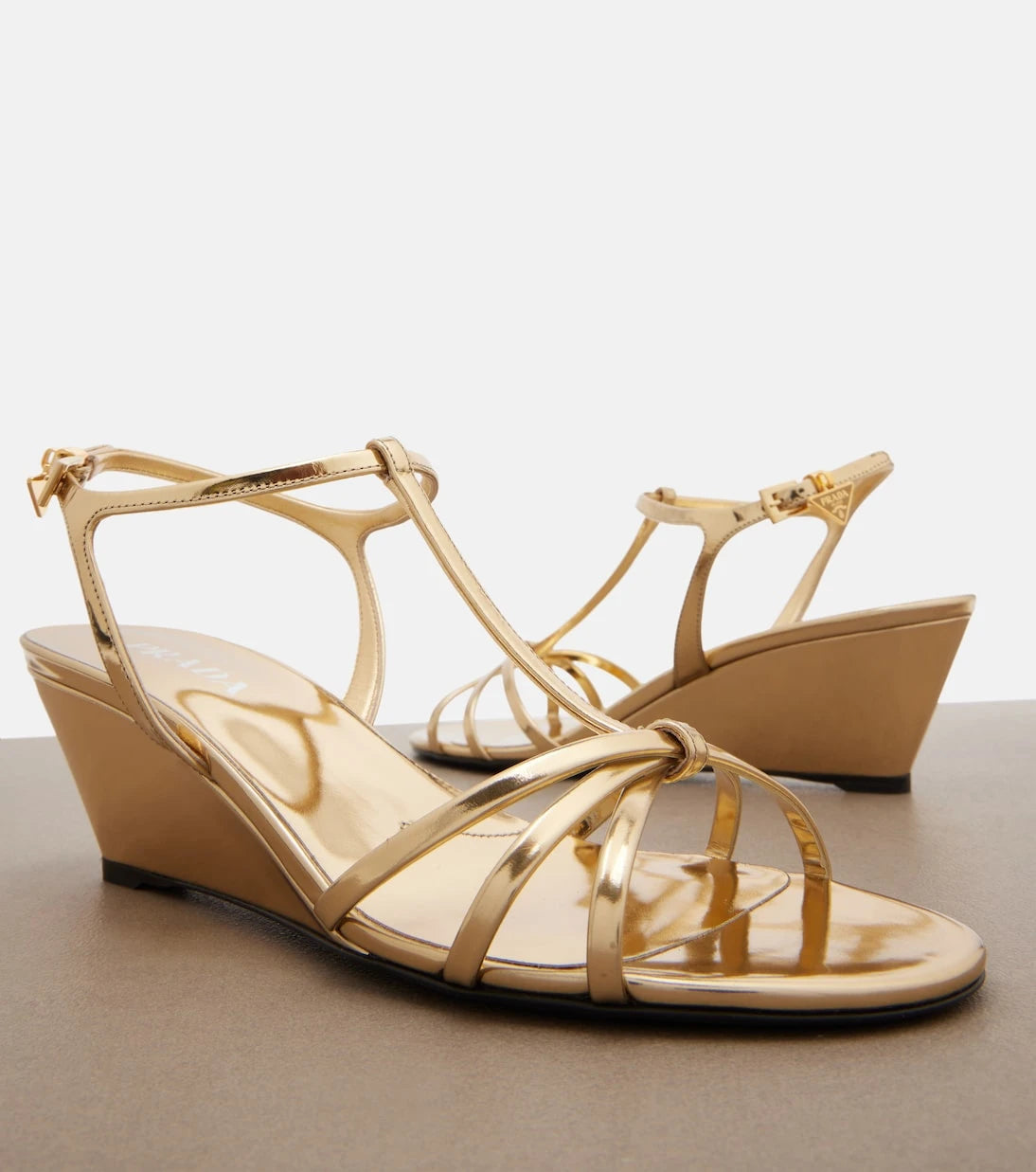 Prada - Metallic leather wedge sandals
