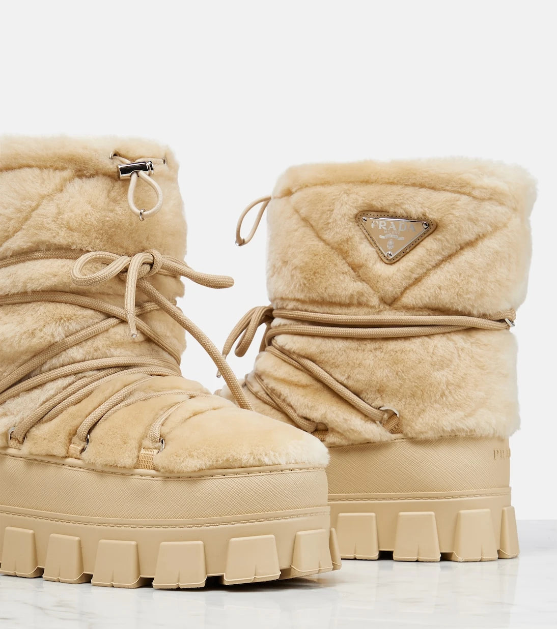 Prada - Shearling and leather snow boots