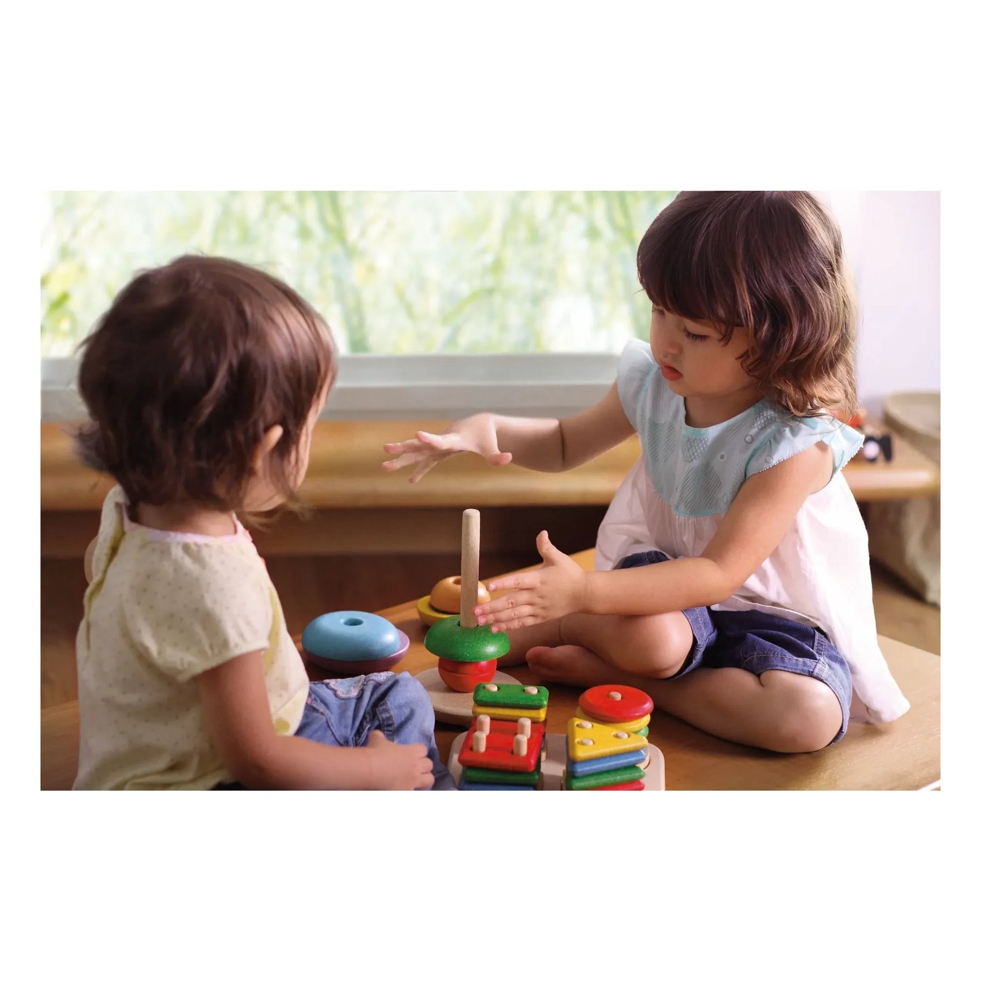 Plan Toys - Geometric stacking game