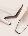 Acquilla White Knee High Flared Boots