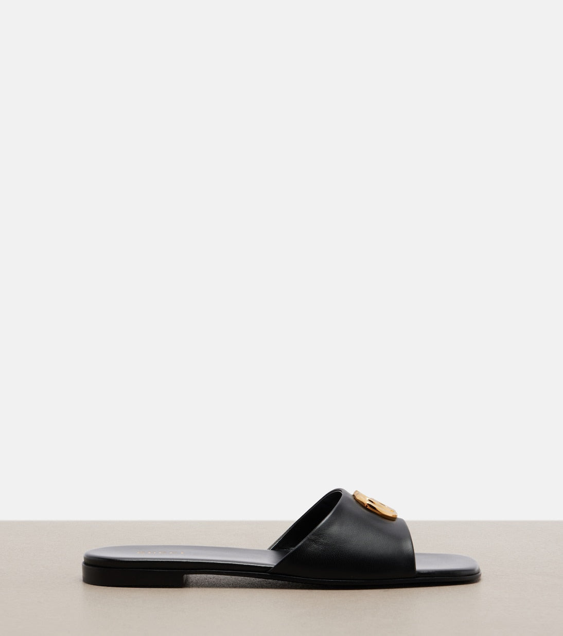 Gucci - Double G leather slides