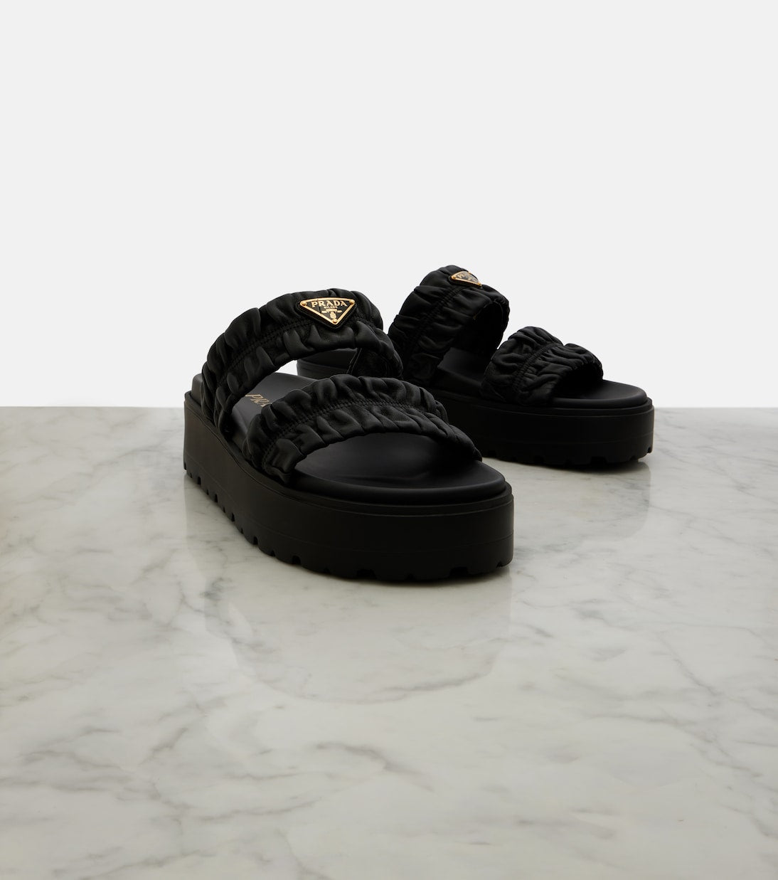 Prada - Matelassé leather platform sandals