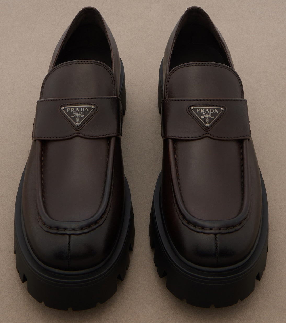 Prada - Logo leather platform loafers