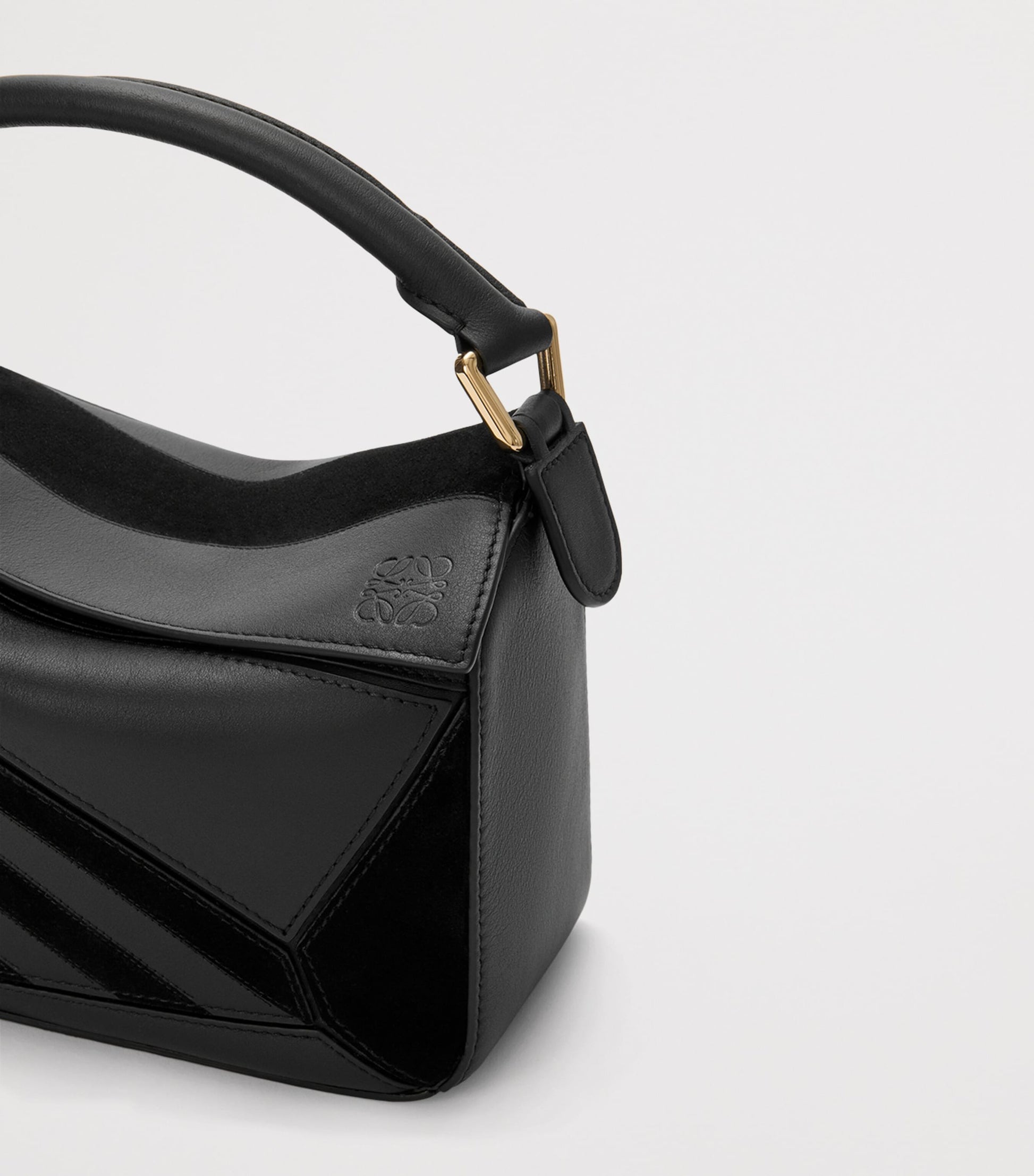 Small Leather Stripe Puzzle Edge Top-Handle Bag