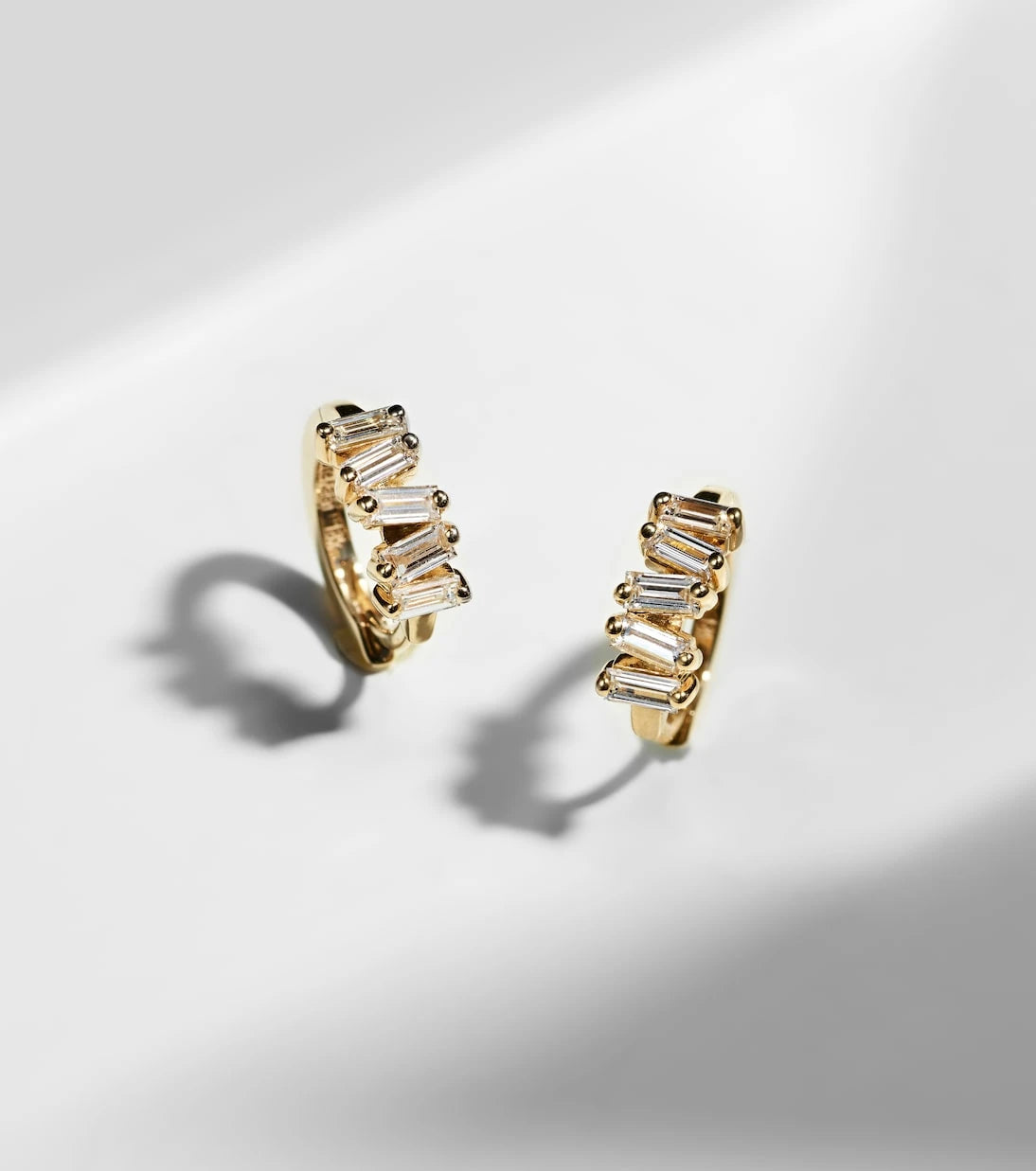 Suzanne Kalan - Bold 18kt gold huggies with diamonds