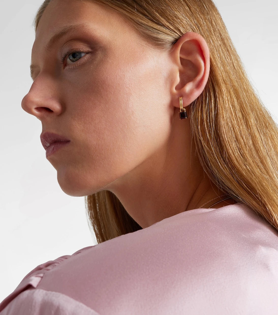 Stone and Strand - 10kt gold earrings with garnets