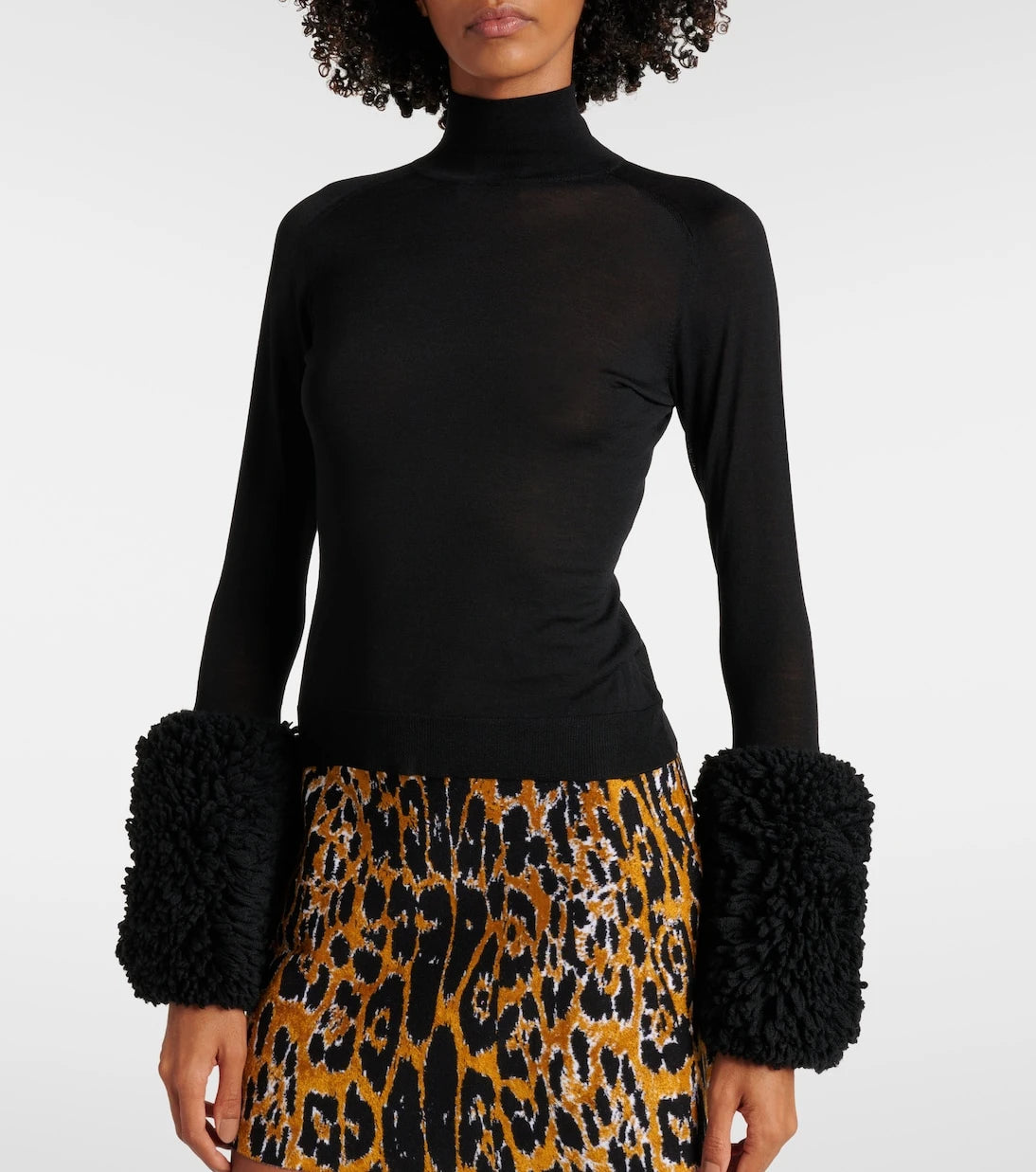 Alaïa - Faux fur-trimmed wool turtleneck top