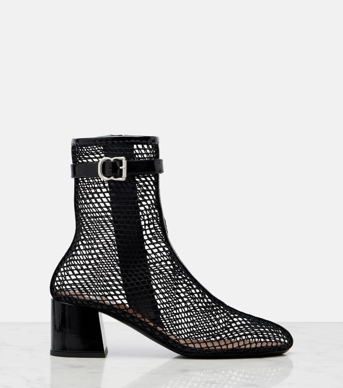 Alaïa - Fishnet patent leather-trimmed ankle boots