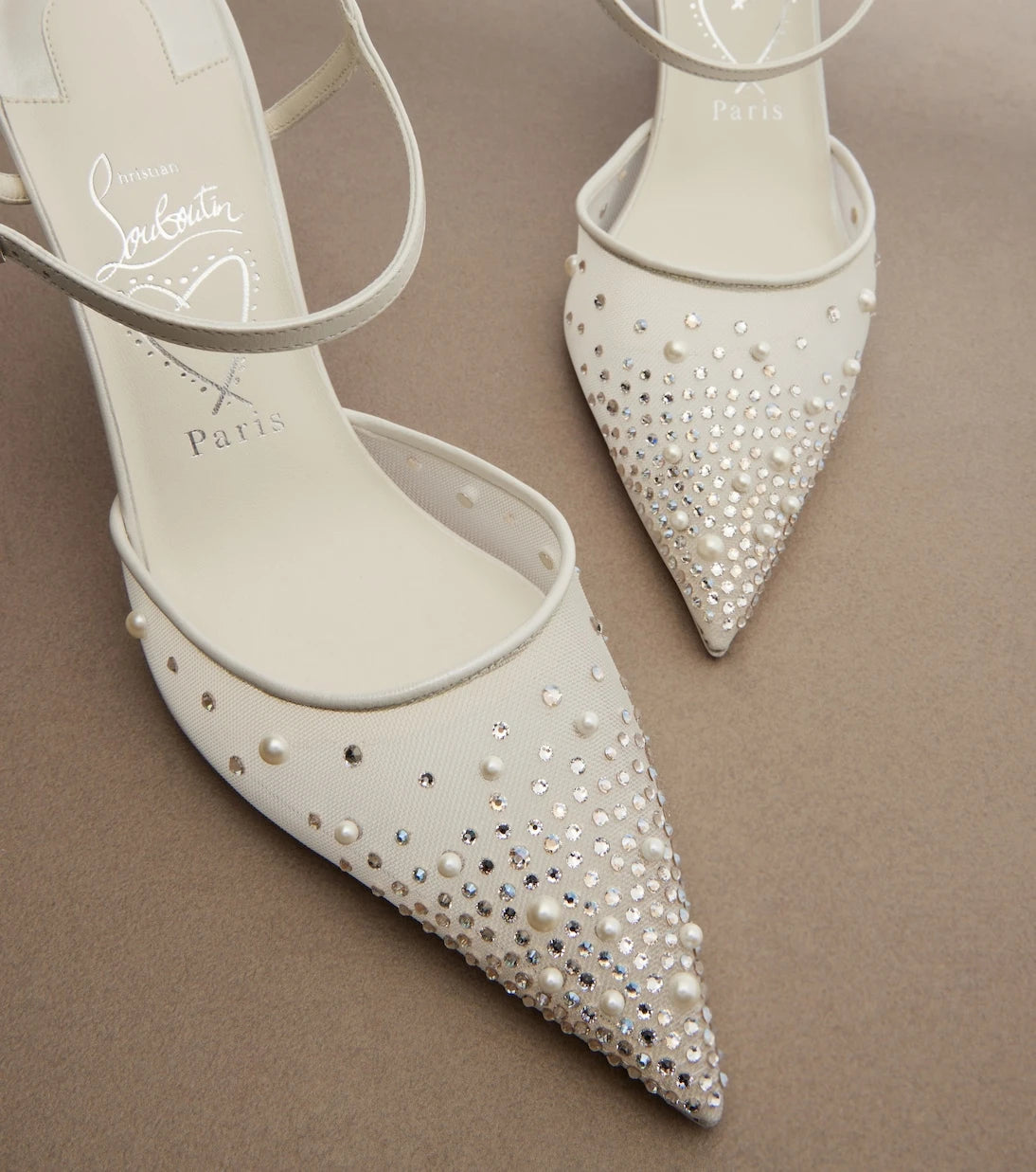 Christian Louboutin - حذاء ميس زي بكعب مزين ورباط خلفي