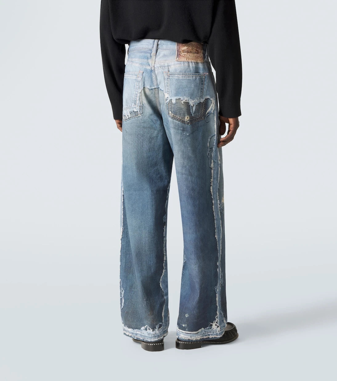 Acne Studios - جينز واسع الساق بتصميم ترومبلوي 1981