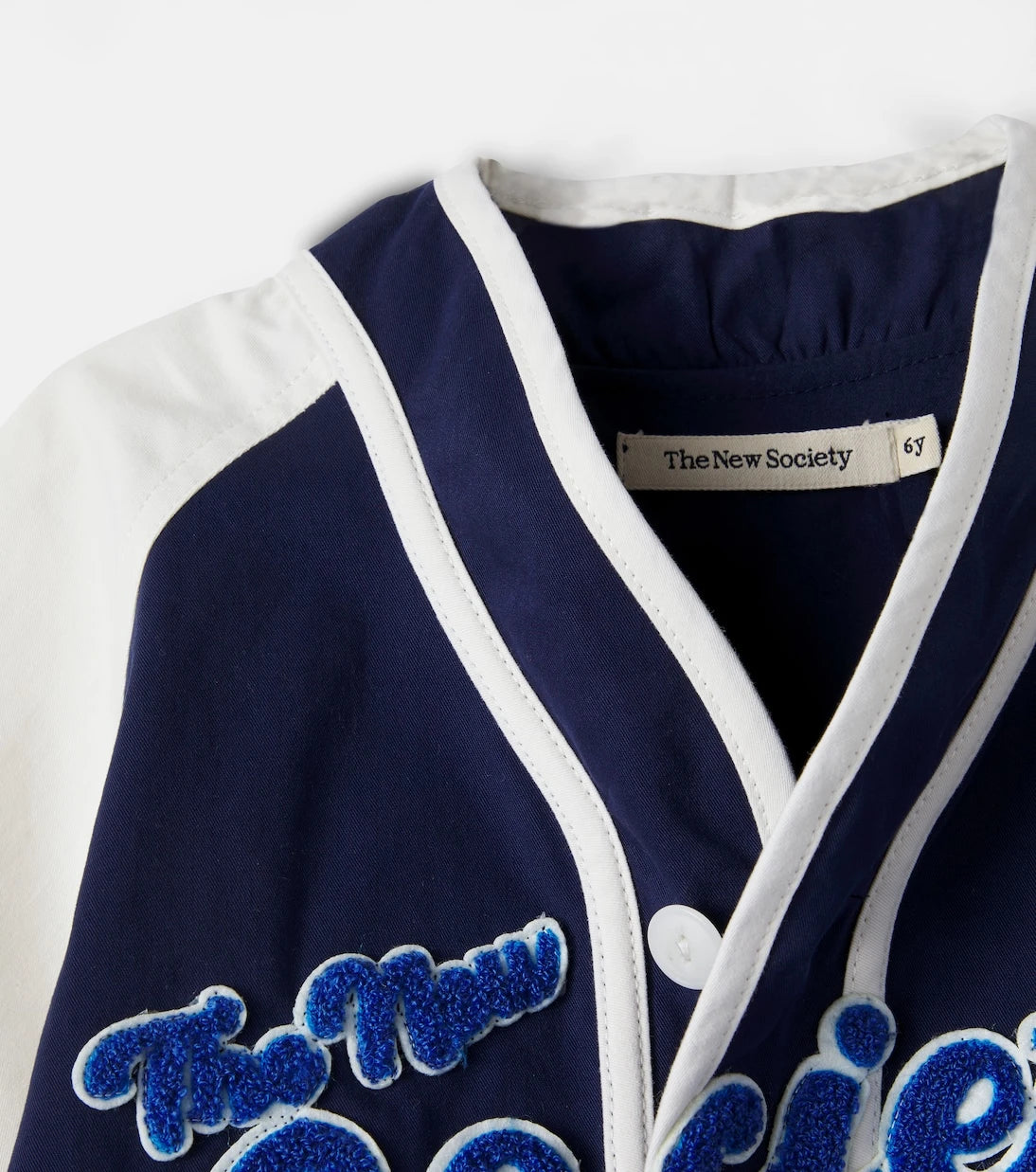 The New Society - Gorse patch-appliqué cotton shirt