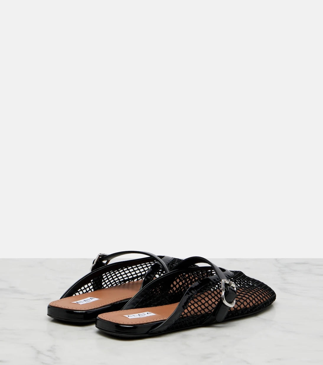 Alaïa - Fishnet leather-trimmed mules