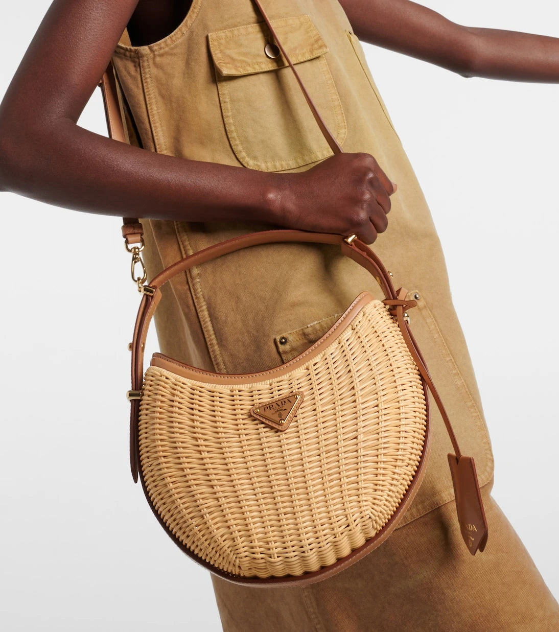 Prada - Arqué woven leather-trimmed shoulder bag