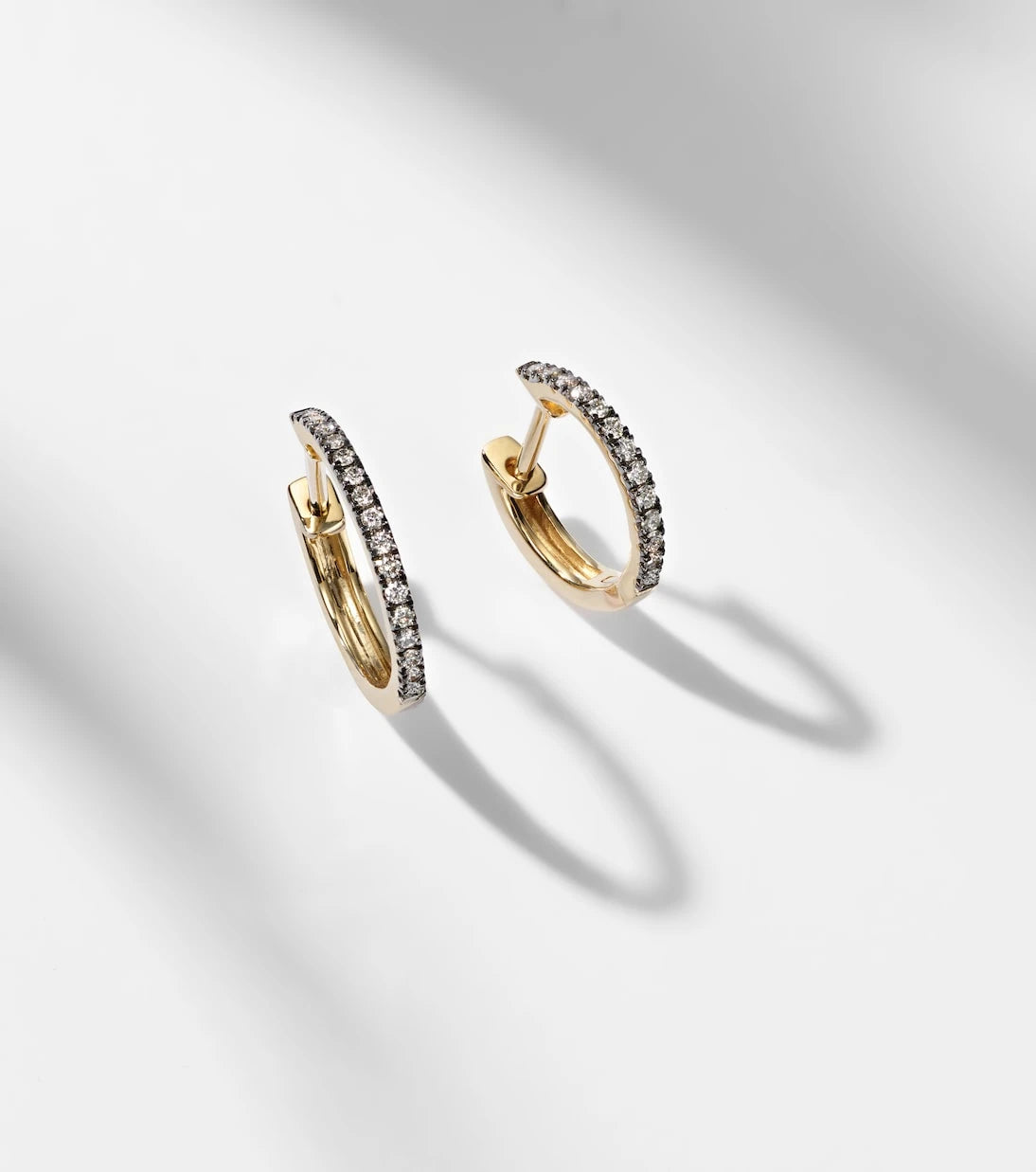 Stone and Strand - Come Closer 10kt gold huggie earrings