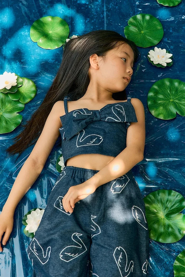 Детска дънкова блуза Tinycottons BIG SWANS DENIM BOW TOP