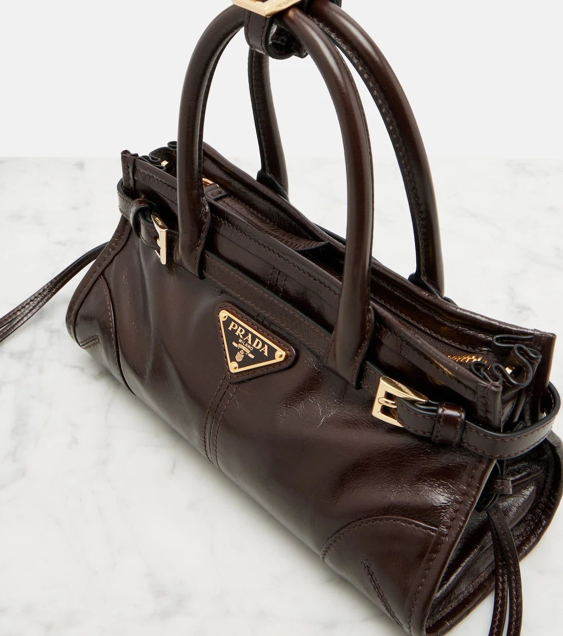Prada - Prada Bonnie Mini leather top-handle bag